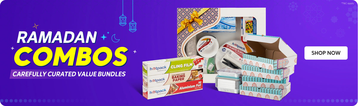 Ramadan Combos banner highlighting carefully curated value bundles featuring Hotpack cling film, baking paper, aluminium foil, plastic plates, foil containers and Ramadan-themed gift food boxes on a purple background with hanging lanterns and Shop Now call to action. بانر عروض رمضان يسلط الضوء على باقات قيمة مختارة بعناية تضم كلينج فيلم هوت باك، ورق خبز، فويل ألمنيوم، أطباق بلاستيكية، علب فويل وصناديق طعام بتصاميم رمضانية على خلفية بنفسجية مع فوانيس وزر تسوق الآن.