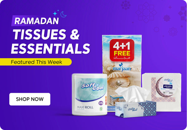 Ramadan Tissues & Essentials banner featuring Soft n Cool maxi roll, facial tissues, dinner napkins and Marjaan tissues with 4+1 free offer badge, highlighted as Featured This Week on a purple Ramadan-themed background with Shop Now call to action. بانر مناديل و مستلزمات رمضان يعرض ماكسي رول سوفت آند كول، مناديل وجه، مناديل سفرة ومناديل مرجان مع شارة عرض 4+1 مجاناً، مميز هذا الأسبوع على خلفية بنفسجية بطابع رمضاني مع زر تسوق الآن.